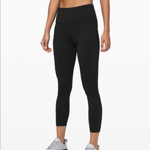 Fast and free high rise tight 25” reflective nulux